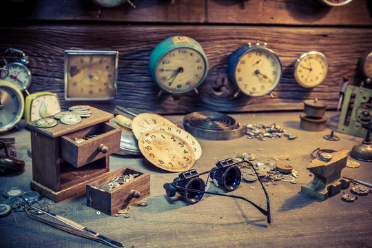 Old watchmaker's room with parts of clocks