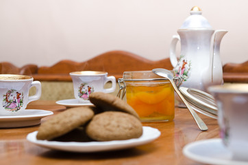 tea with cookies and jam/ tea set, jam and cookies on a plate