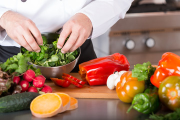 Chef chopping vegetables