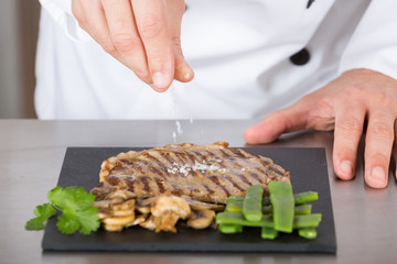 Chef finishing your plate