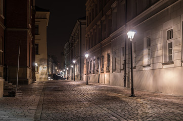Fototapeta Jagiellonska street in university quarter, Krakow, Poland, in the night obraz