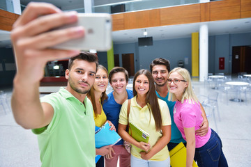 happy students group make selfie in classroom