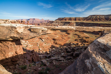 Girl on Muscleman Arch, Canyonlands National Park