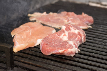 Frying beef steak on the grill