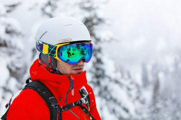 Portrait of skier in high mountains