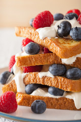 french toasts with creme fraiche and berries for breakfast