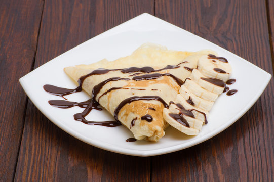 Crepes with bananas and cream