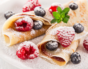 Tasty pancakes with fresh berries