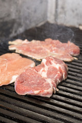Frying beef steak on the grill