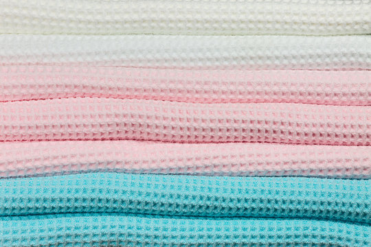 Colorful folded towels close-up.