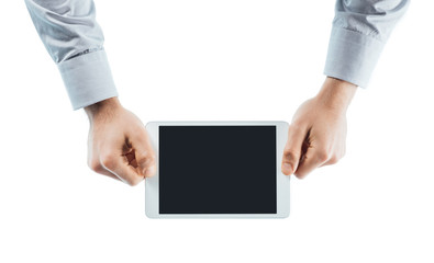 Hands holding a tablet