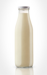 Closed bottle of milk isolated on white background