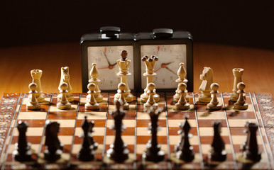 Сhessboard, clock and figures