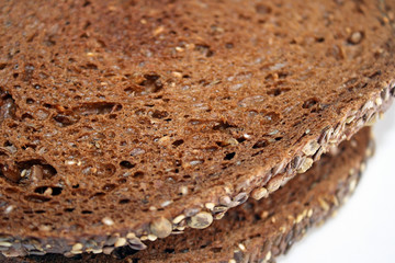 Slices of nutritious dark Rye bread with whole grains 
