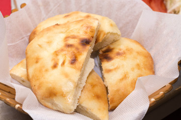 Sliced homemade bun in the bucket