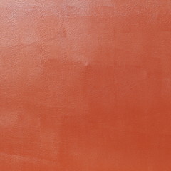 painted orange wall texture and background