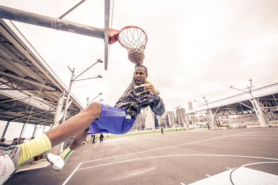 Man Playing Basketball