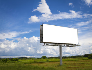 Empty billboard in front of beautiful cloudy sky in a rural location - obrazy, fototapety, plakaty