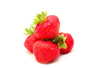 ripe strawberries isolated on white