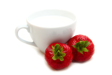 cup of milk and strawberries