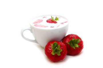 cup of milk and strawberries