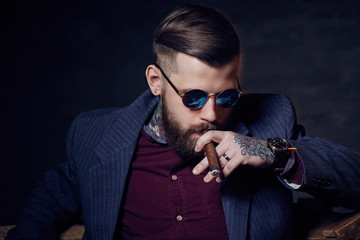 Bearded man in sunglasses.