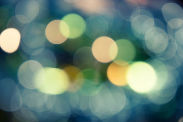 Obraz premium Golden and green bokeh background