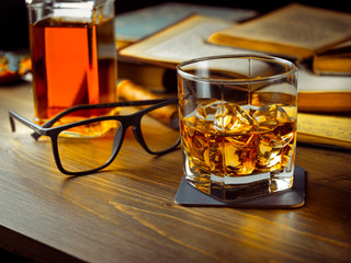 Whiskey on the rocks and scholar books