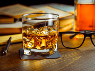 Whiskey on the rocks and scholar books