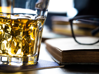 Whiskey on the rocks and scholar books