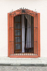 Wrought iron grate over open windows, Oaxaca, Mexico