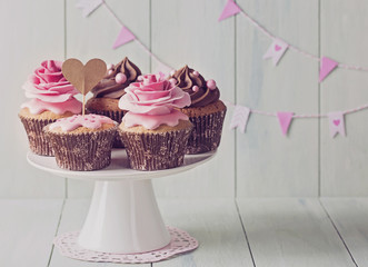 Cupcakes with sweet rose flowers