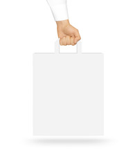 Blank white paper bag mock up holding in hand. 