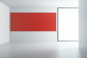 Red poster on white wall in empty room