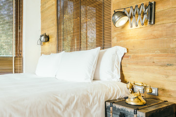 White pillow on bed in bedroom