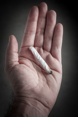 marijuana cigarette in a hand