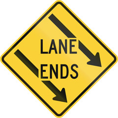 Road sign used in the US state of Delaware - Lane ends warning sign