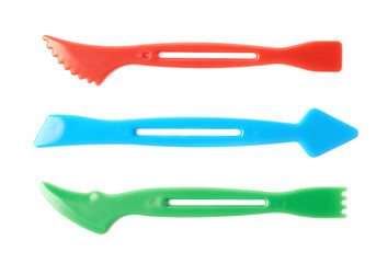 Plastic modeling clay chisel isolated