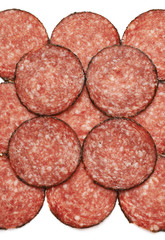 Surface covered with slices of salami