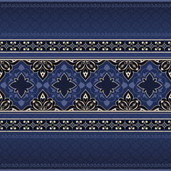 Filigree seamless golden border on blue background.