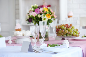 Beautiful served table for wedding or other celebration in restaurant