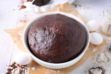 Cooked chocolate pie in a baking tray on a table