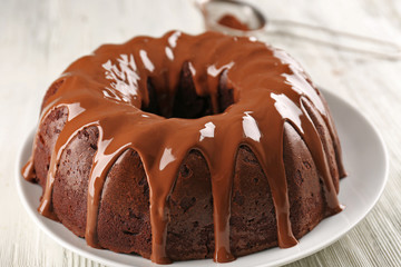 Round cake on plate closeup