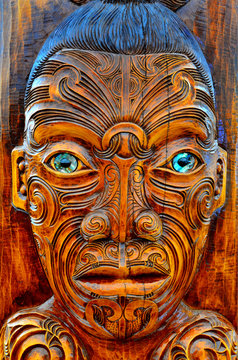 Maori man face wood carving sculpture