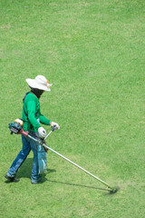 Man mowing grass