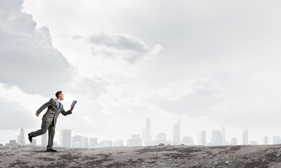 Man reading on the run