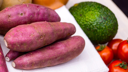 Japanese sweet potato with avocado and tomato