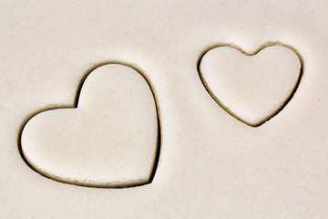 Obraz premium Two hearts on dough layer