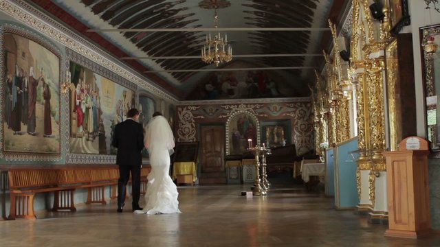 Bride and groom in the church.