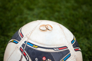 wedding rings and football